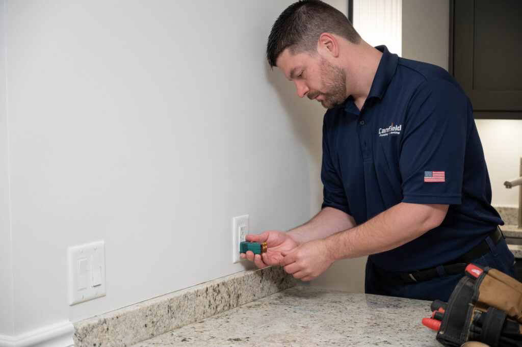 Electrician performing an electrical installation job