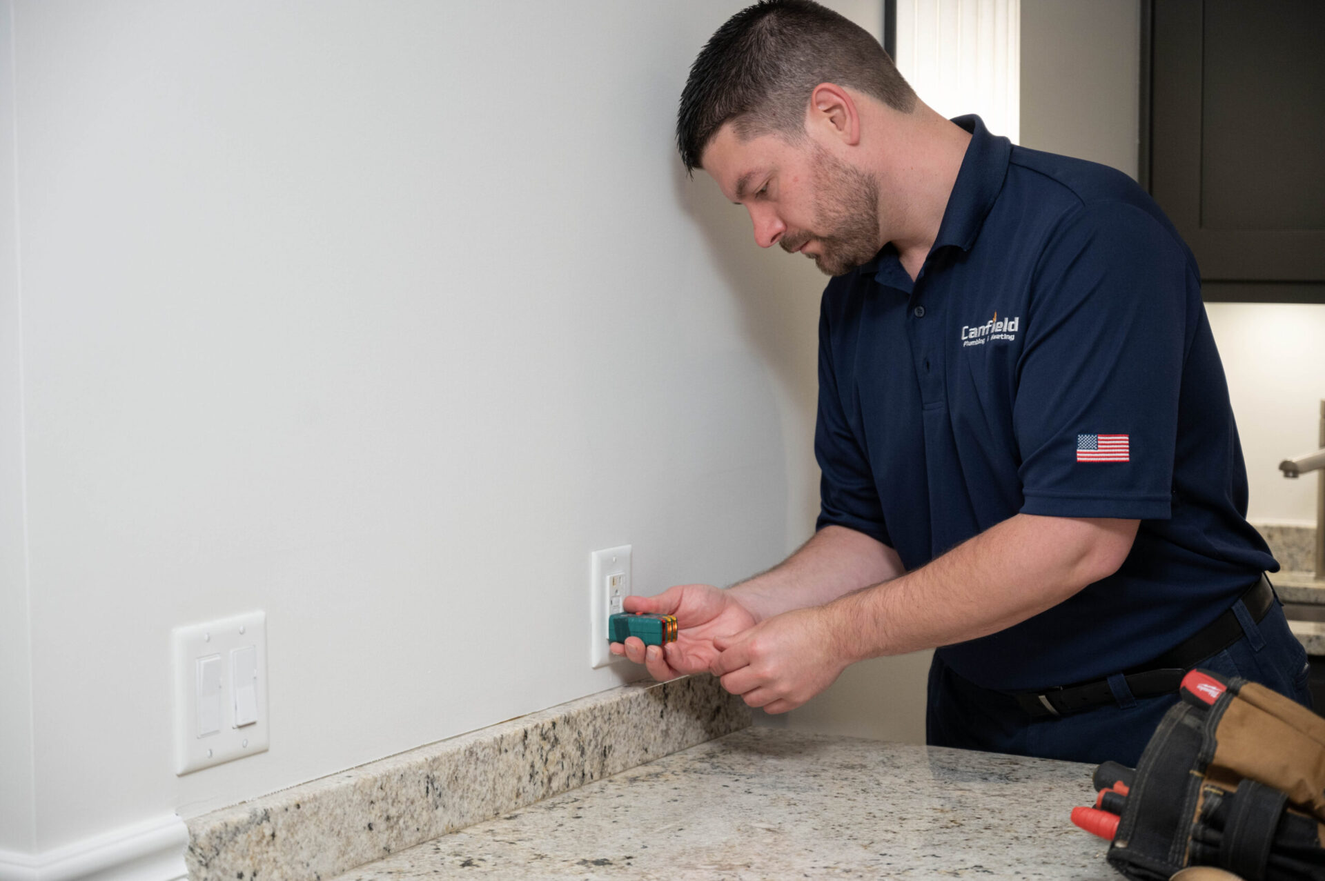 Electrician performing an electrical installation job